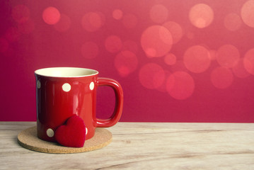 red mug and red heart