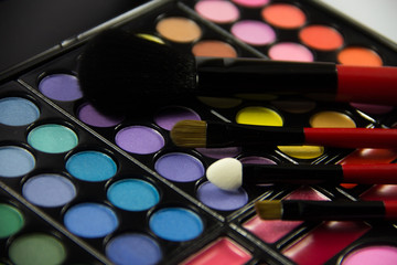 Eyeshadow Palette. Decorative cosmetics. Makeup brushes