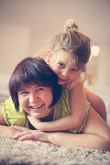 Portrait of grandmother and granddaughter.