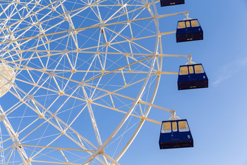 Ferris wheel with blue sky