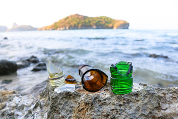 Broken glass bottle on the beach. 