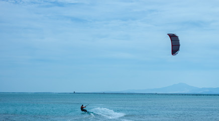 man kite surfing bad weather