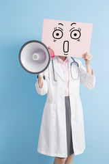 doctor take billboard and microphone
