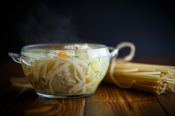 soup with noodles and meatballs