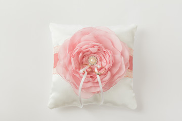 pillow for wedding rings in a pink flower