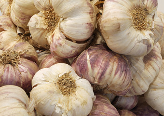 cloves of garlic for sale at the greengrocer