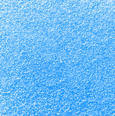 Winter snow on blue