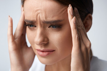 Health. Beautiful Woman Having Strong Headache, Feeling Pain