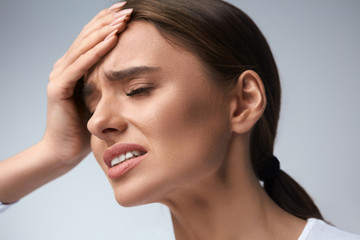 Woman Pain. Girl Having Strong Headache, Suffering From Migraine