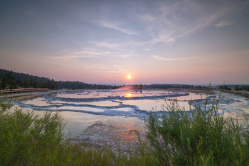 Sunset reflections over Great Fountain Geyser 