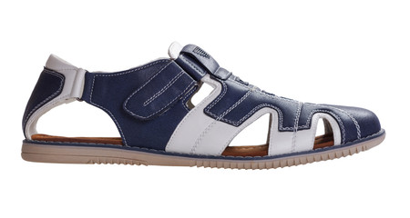 Naklejka premium Blue and white leather sandals on white background