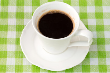 Cup with a black coffee