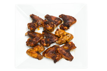 Plate of delicious barbecue chicken wings