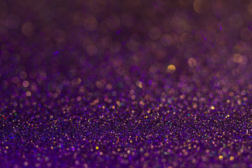 Amazing glitter and glow multi colored bokeh shining. Dark abstract dreamy wunderful sparkle background