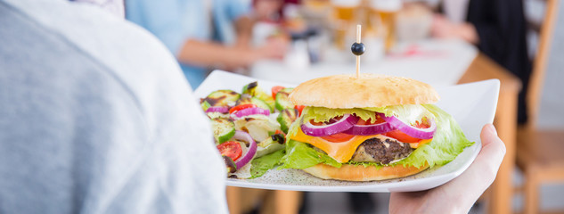 Woman holding a plate