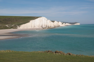 Seven sisters cliffs from afar with grass foreground