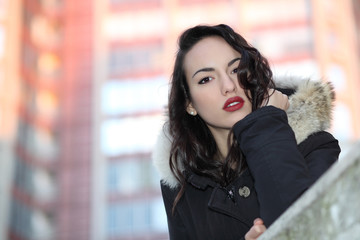 Portrait of beautyful girl in urban background