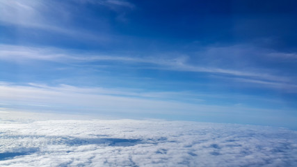 view the outer aircraft on the sky above the clouds in morning