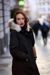 Obraz premium Portrait of beautyful girl in urban background
