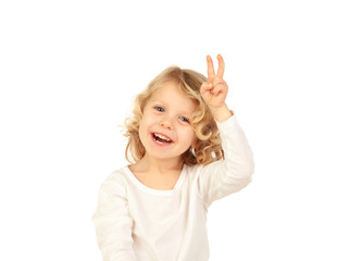 Small blond child doing victory sign with his fingers