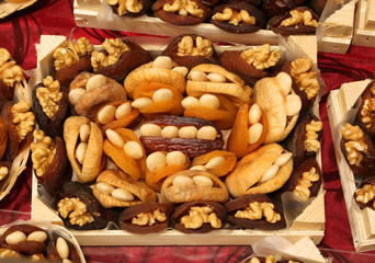 dried fruits stuffed with walnuts in the small basket for sale a