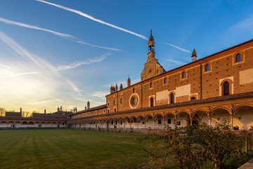 Grand Cloister facade of the Pavia Carthusian monastery at sunse