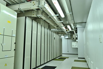 Data center with auxiliary communications and cooling system. A complex system of electric networks of communication.