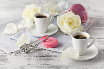 Valentine's setting with bouquet of white roses and coffee. Sele