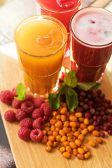 fruit drink with cranberries raspberries and sea buckthorn