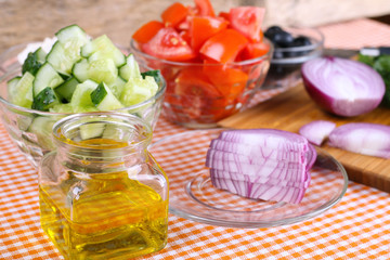 Mediterranean cuisine greek salad ingredients. Cooking salad at the kitchen.