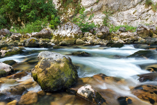 In the mountains of Abkhazia. The flow of water in a mountain river Yupshara