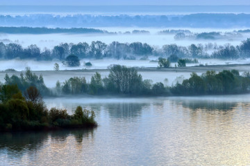 Spring. The morning fog lies along the Volga's banks