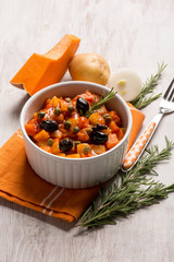 ratatouille with pumpkin capers potatoes and black olives