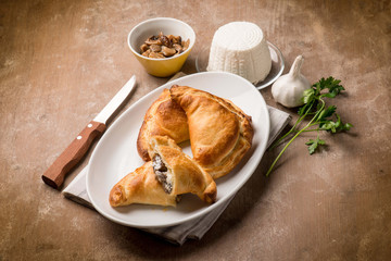 panzerotti stuffed with boletus mushrooms and ricotta cheese
