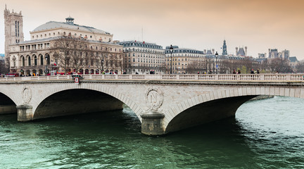 Obraz premium Paris view of the Pont au Change and the Seine river, Toure Saint Jaques in the background