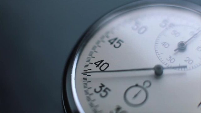 Clock on a dark background.