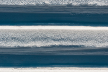 Closeup background photo of tracks of skis