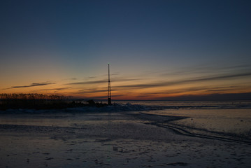 Sunset on Lake Balaton completely frozen