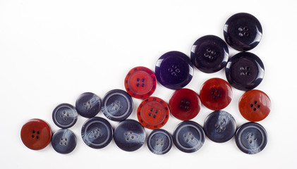 sewing buttons collection. Various sewing buttons with a thread.