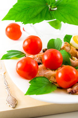 View close-up on a salad of blanched pieces of seafood