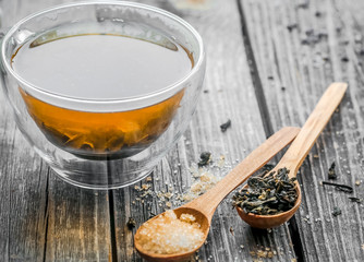 transparent tea Cup with wooden spoons