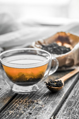 transparent tea Cup with wooden spoons