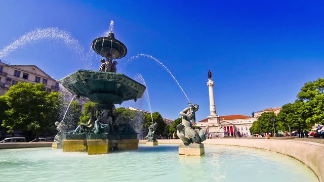 Baroque fountain on Rossio square in center of Lisbon city, Portugal. Time Lapse