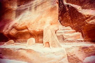 ancient rock carvings near Al Khazneh - treasury, the ancient city of Petra, Jordan. Wadi Rum