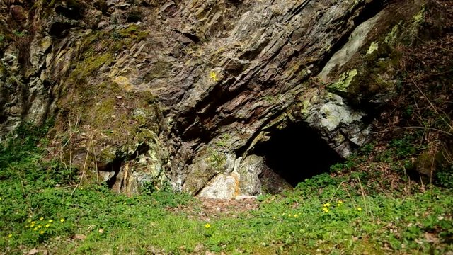 Entrance to the cave of a high rock
