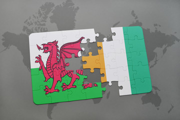 puzzle with the national flag of wales and cote divoire on a world map
