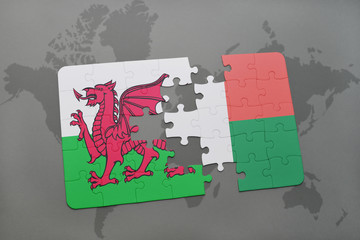 puzzle with the national flag of wales and madagascar on a world map