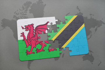 puzzle with the national flag of wales and tanzania on a world map