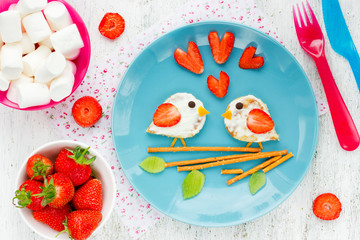 Obraz na płótnie Canvas Love Birds sandwich from pancake with cream and strawberry