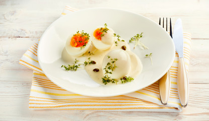Hard boiled eggs in mustard and caper sauce